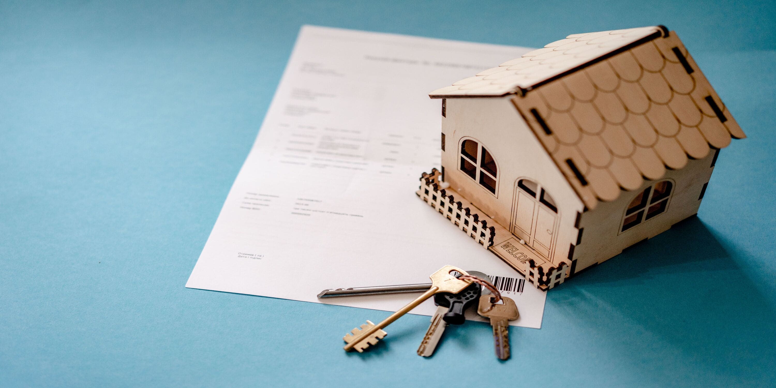 house documents and keys at a real estate agency