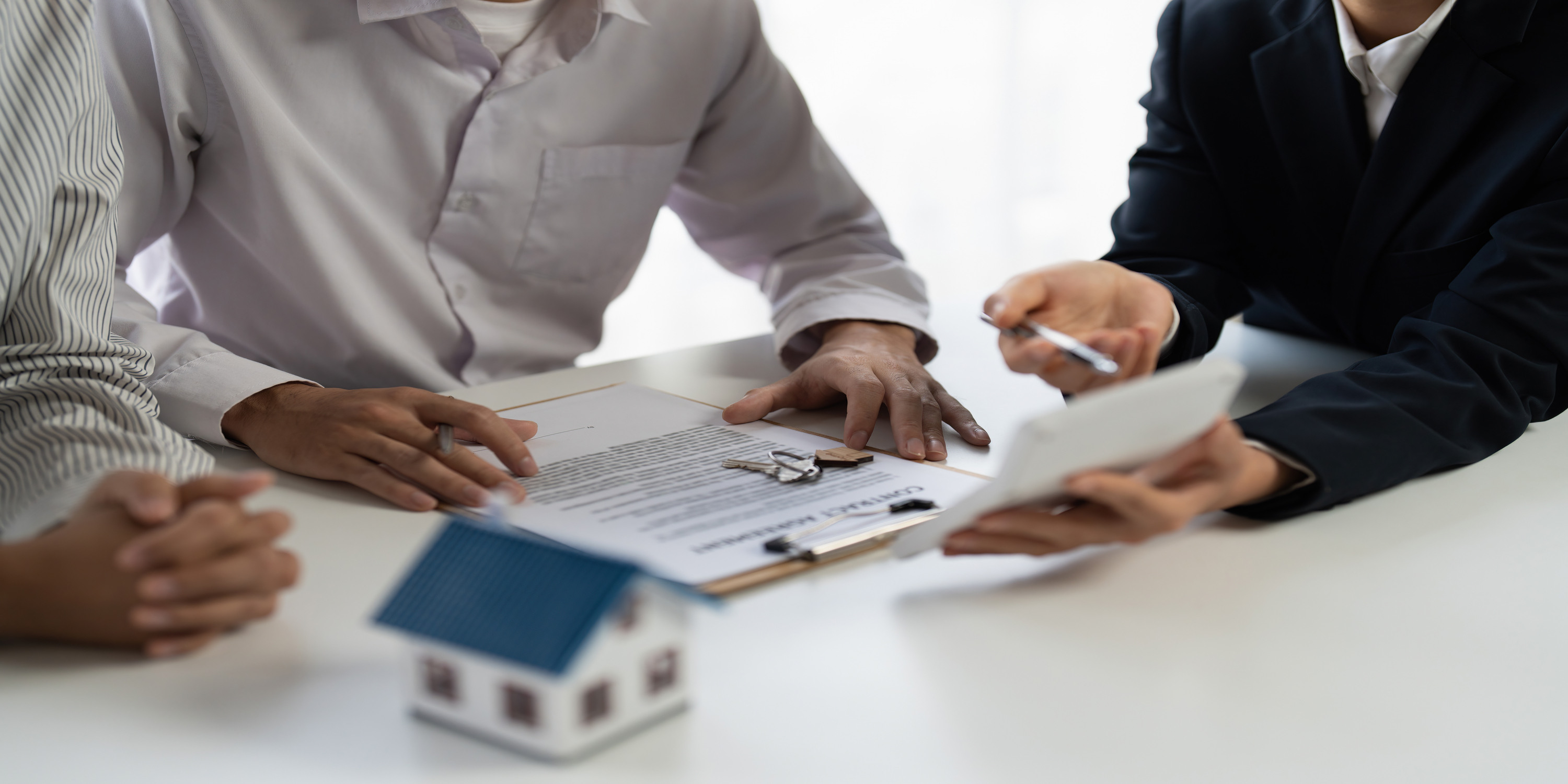 signing documents when buying a property in Dubai