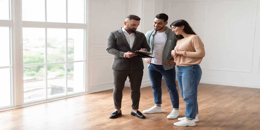 real estate agent showing a property